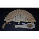 A 19th Century ''Jenny Lind'' or Palmette Fan with original, shaped, box. Each shaped fan panel is