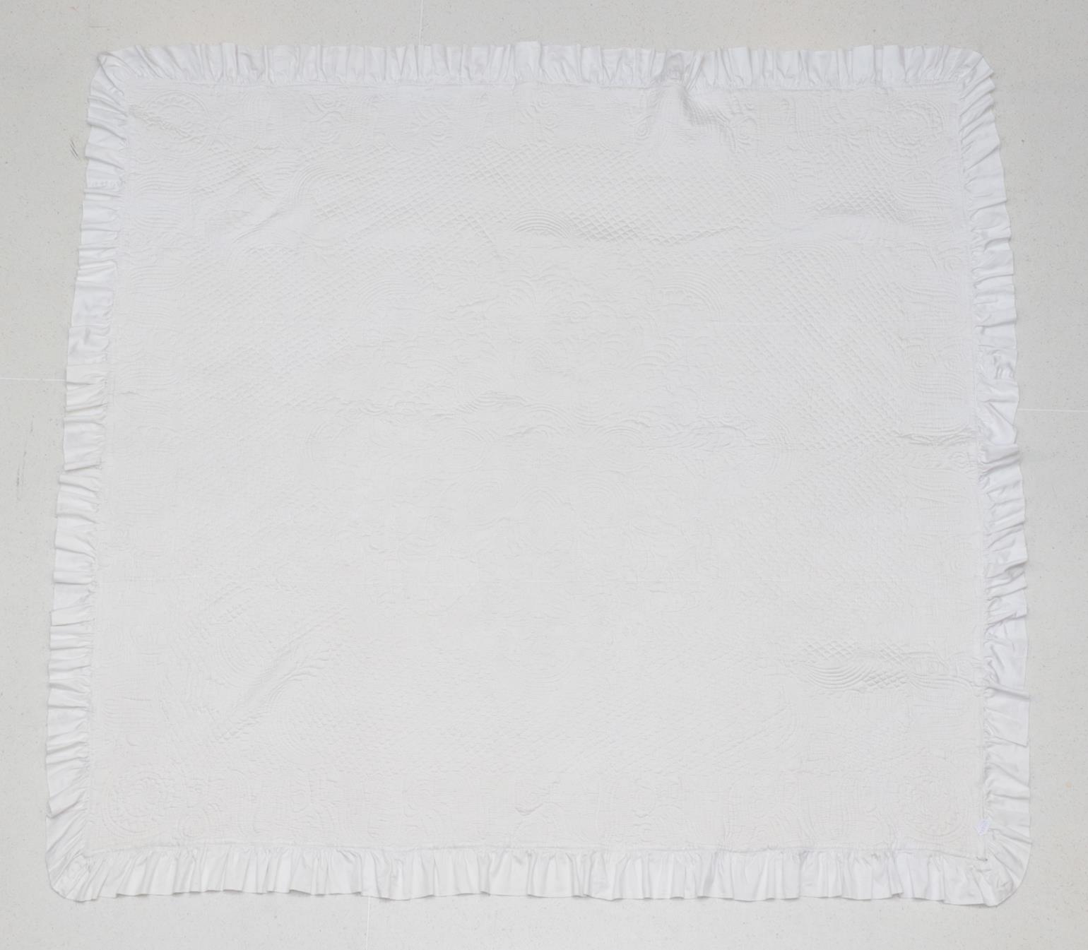 Late 19th Century White Cotton Reversible Quilt, finely quilted overall with a central flower