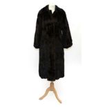 Blackglama Northern Export Fur of Leeds Dark Brown Mink Coat, with cuffed sleeves and collar. Slight