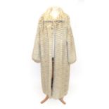 A Cream and Light Grey Checked Mink Long Coat, with slit pockets, the burgundy lining embroidered