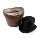 W English, Pall Mall Black Silk Top Hat, initialled 'JR', in a brown leather hat case with dark