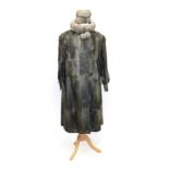 Silver Grey Shaved Astrakan Coat, with Nehru collar, long sleeves and cuffs (size 10-14); Silver