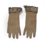 Pair of 17th Century Leather Gauntlets, with floral embroidery and silver work trims, silk and kid