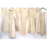 Early 20th Century Wedding Dresses, comprising a Gordon Gowns white lace mounted long sleeved