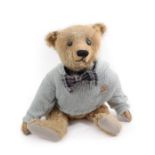 Early 20th Century Steiff Jointed Teddy Bear, in yellow plush with stitched nose, boot button