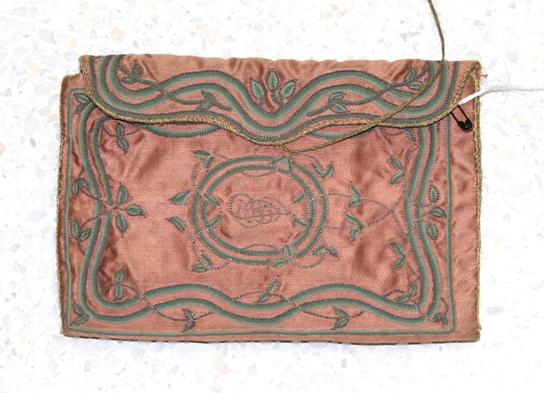 18th Century Rust Red Silk Pocket Book, with decorative green sinuous stem and leaf embroidery