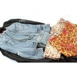 Dolce and Gabbana Clothing comprising a Vintage Distressed Denim Corset Jacket with long sleeves,