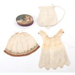 19th Century Dolls Costume, including a white cotton pocket, a white dress with zig zag hem