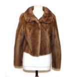 Light Brown Mink Evening Jacket of cropped design. Slight wear. 36'' bust, 20'' long and 17''