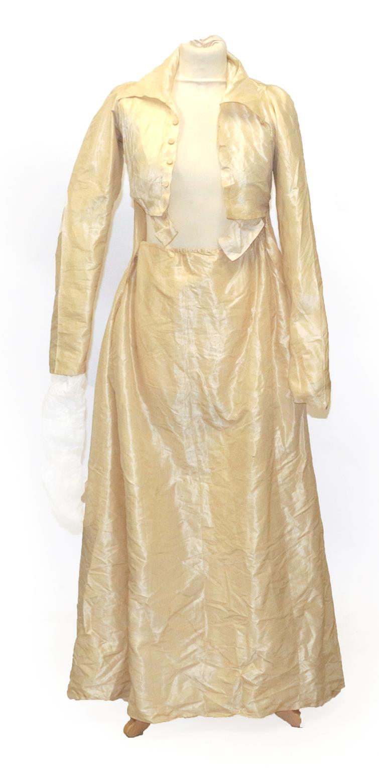 A Circa 1790 English Cream Silk Round Gown, with long sleeves, buttoned bodice with collar and