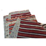 Eastern Trace Kilim comprising horizontal stripes of brown, navy blue, pale blue, white and