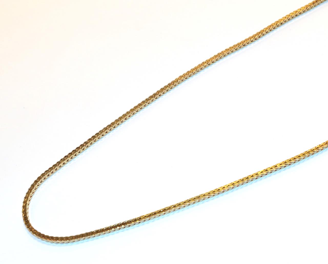 A 9 carat gold fancy link chain, length 65cm . Gross weight 27.5 grams.