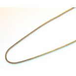 A 9 carat gold fancy link chain, length 65cm . Gross weight 27.5 grams.