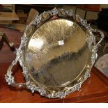 A Victorian silver plate tray, maker's mark TW&S, circa 1880, shaped oval and with foliage cast