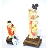 A Japanese ivory figure of Guan Yin, circa 1920's, 20.5cm; together with a figure of a boy with