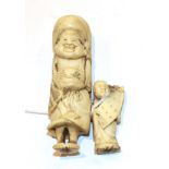Japanese ivory netsuke, foreigner and boy, 7.5cm high. Weight 40g