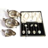A set of seven George VI silver and enamel teaspoons, the bowl of each spoon enamelled with a