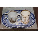 An early 19th century hand painted and gilded loving cup with another, and a pearl ware meat plate