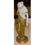 A Royal Worcester figure of a Classical maiden, puce backstamp 2/57, 41cm high . Minor, wear and