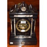A Victorian black slate and marble mantle clock with Roman dial and with visible escapement, 35cm