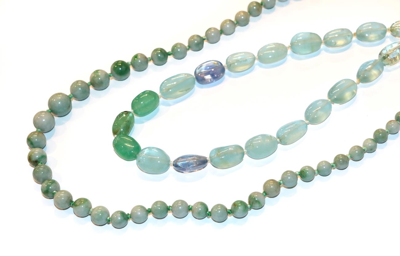 A jadeite bead necklace, length 76cm, and a quartz and beryl bead necklace, length 43.5cm (2).