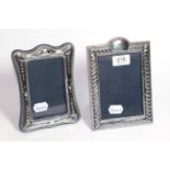 Two Elizabeth II silver photograph-frames, the first by Keyford Frames Ltd., London, 1973, oblong