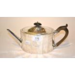 A George III silver tea pot, London marks with crest together with a pair of stirs and a pair of