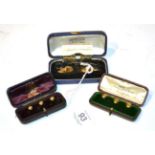 A pair of cufflinks, stamped '18CT' (a.f.) and six dress studs . Cufflinks - 6.9 grams. Three