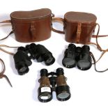 A pair of WWII field glasses, Mk 5, L Petit, and two other cased pairs of binoculars, one example by