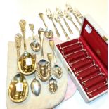 A collection of George II and later flatware, including: a Hanoverian pattern table-spoon; five