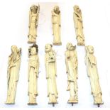 A set of eight Chinese ivory figures of immortals, Qing dynasty, all approx 18cm high . Total weight