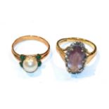 An 18 carat gold amethyst and diamond cluster ring, finger size N1/2 and a cultured pearl ring,