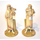 Two Royal Worcester figures of musicians, model numbers 1084, impressed and puce printed marks (a.