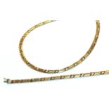 A bi-colour fancy link necklace and bracelet suite, stamped '375', length 43cm and 18.5cm . Gross