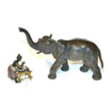 A late 19th century Austrian cold painted bronze elephant and an Austrian cold painted bronze erotic
