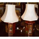 A pair of modern decorative painted hexagonal metal table lamps with shades, bases 52cm high. In