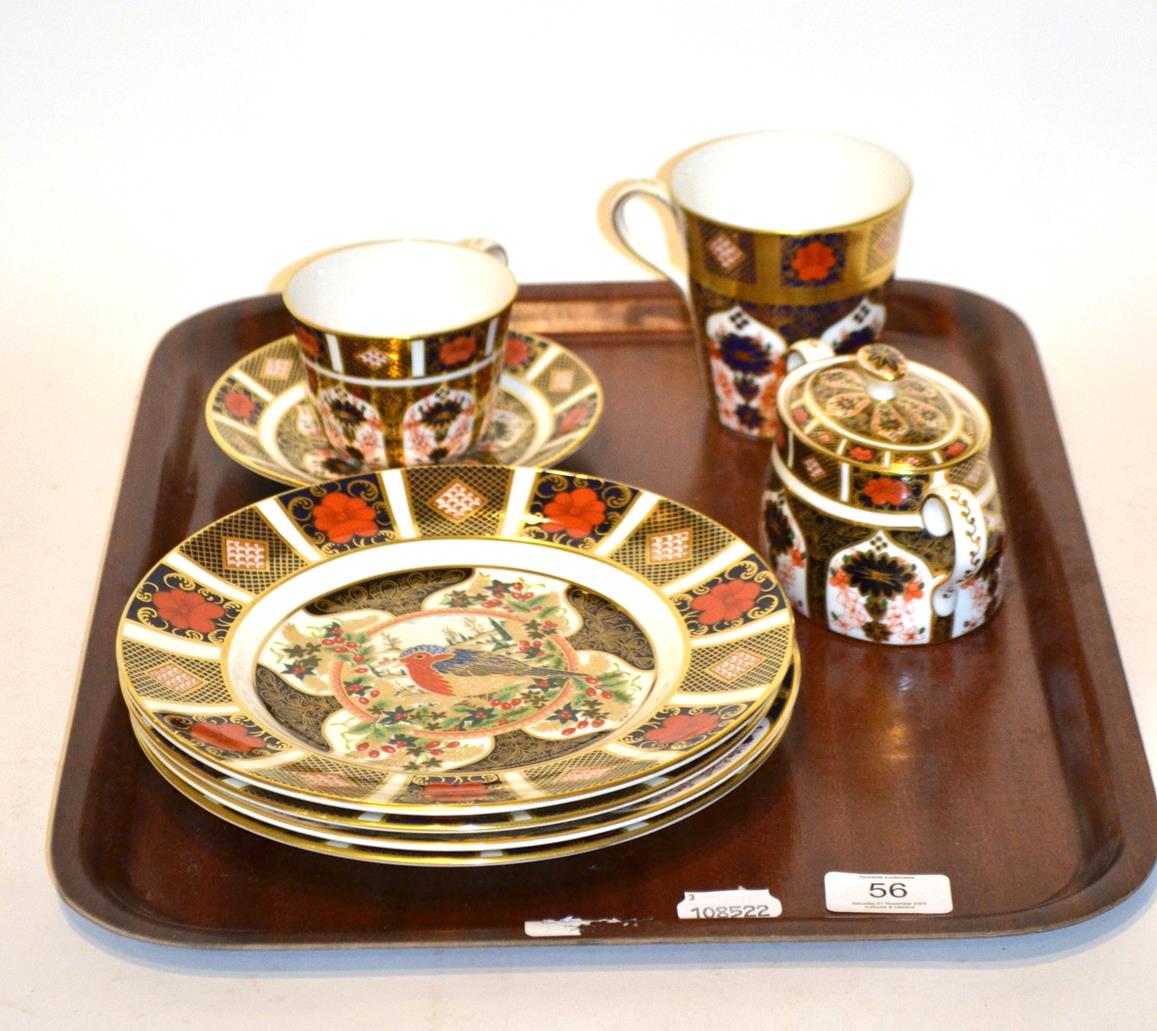 Four Royal Crown Derby Christmas plates, sugar basin, mug and tea cup with saucer, plates 22cm