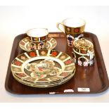 Four Royal Crown Derby Christmas plates, sugar basin, mug and tea cup with saucer, plates 22cm