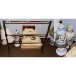 A decorative porcelain and gilt metal lamp, two mahogany and satinwood picture frames, towel rail