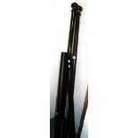Pair of ebonised curtain poles and two others, largest 188cm long