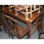 A Provincial plank-top farmhouse kitchen table, 168cm by 72cm by 78cm high