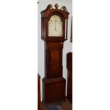 A Victorian inlaid oak and mahogany cased thirty-hour longcase clock, the painted 12'' arch dial