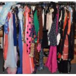 Rail of assorted circa 1960s and later ladies wear including evening wear, jacket, separates etc (