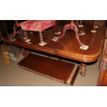 A 20th century mahogany stained extending dining table with four extra leaves, 298cm (extended) by