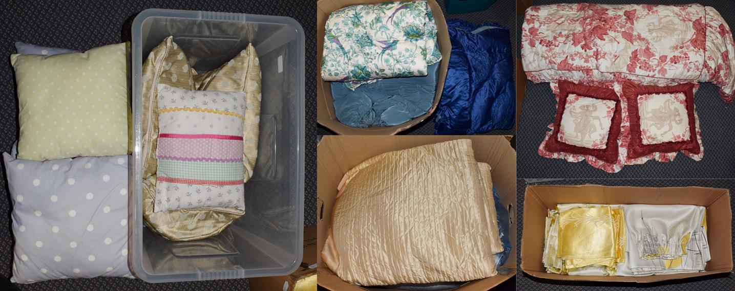 Assorted bedding and textiles comprising two cream bed spreads, red and white bed cover, matching