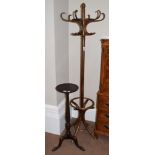A bentwood hat stand, 194cm high; together with a mahogany torchere on ball and claw feet, 92cm high