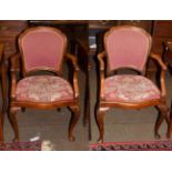 Pair of Waring & Gillows walnut armchairs