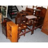 Furniture comprising a mahogany bedside cupboard; small open bookcase; an oak book trough; an oak