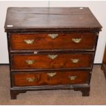 A Provincial early 19th century oak three-height chest of drawers, 73cm by 42cm by 72cm high