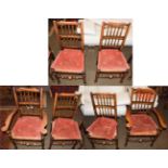 A set of six 19th century Lancashire rush seated chairs, including two carvers, spindle backs,